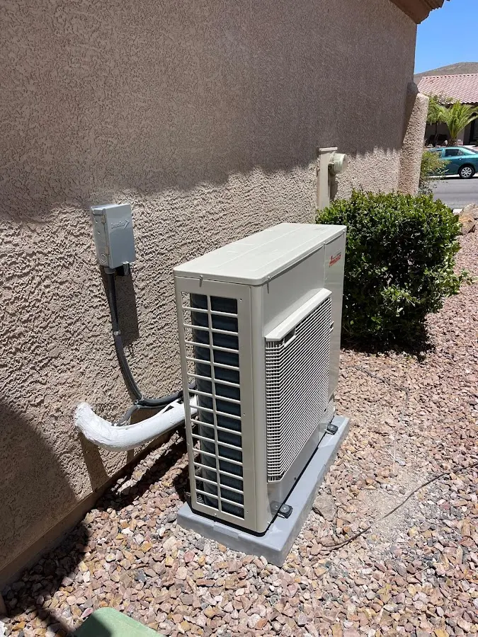Residential air conditioning condenser unit in Flagstaff
